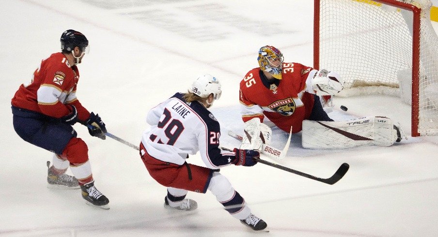 Feb 24, 2022; Sunrise, Florida, USA; Columbus Blue Jackets left wing Patrik Laine (29) scores a goal on Florida Panthers goaltender Jonas Johansson (35) during the first period at FLA Live Arena.