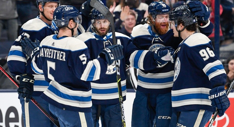 Columbus Blue Jackets right wing Oliver Bjorkstrand (28) celebrates his goal with teammates in the first period against the Pittsburgh Penguins at Nationwide Arena