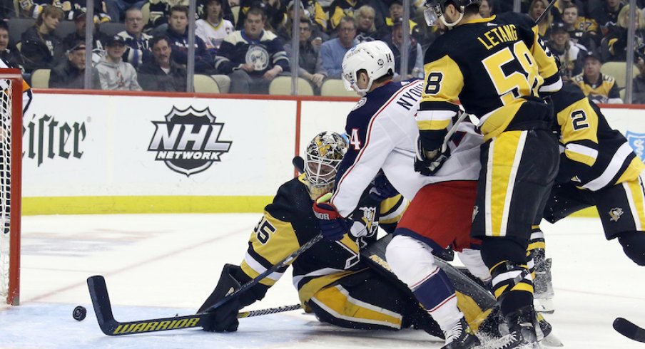 Columbus Blue Jackets' Gus Nyquist pokes through his 16th goal of the season against the Pittsburgh Penguins in the first period at PPG Paints Arena.