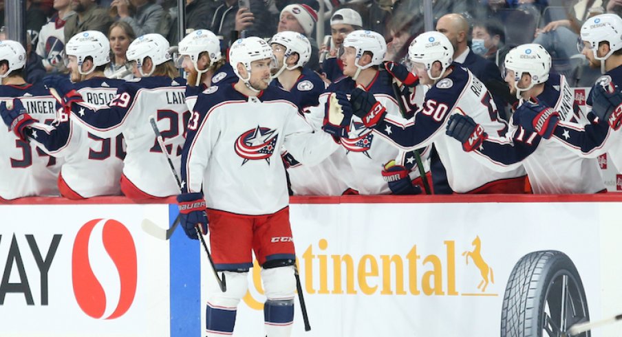 Columbus Blue Jackets forward Brendan Gaunce (23) is congratulated by his team mates on his goal against the Winnipeg Jets during the second period at Canada Life Centre. 