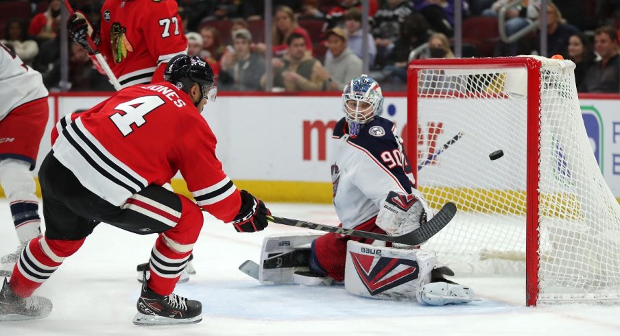 Seth Jones shoots on Columbus Blue Jackets goaltender Elvis Merzlikins