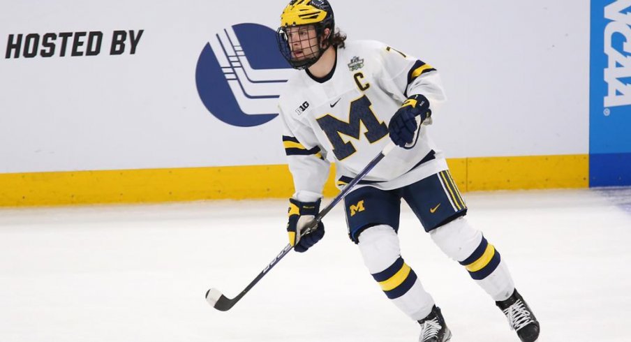 University of Michigan defenseman Nick Blankenburg skates during a NCAA Frozen Four semifinal game against the University of Denver.
