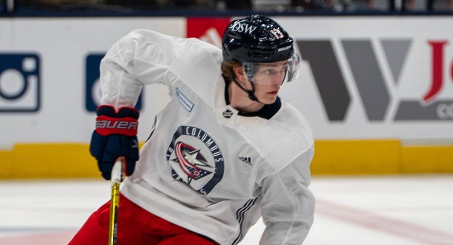 Kent Johnson takes part in his first practice with the Columbus Blue Jackets at Nationwide Arena