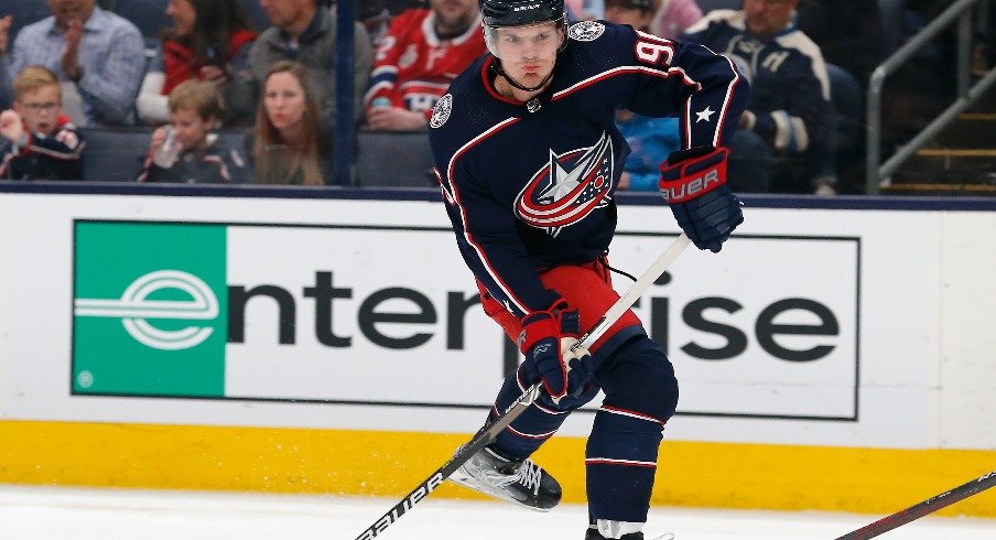 Columbus Blue Jackets center Jack Roslovic  takes a wrist shot against the Montreal Canadiens during the second period at Nationwide Arena