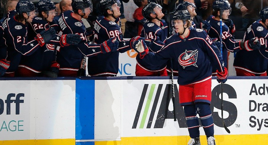 Columbus Blue Jackets defenseman Adam Boqvist celebrates a goal against the San Jose Sharks during the first period at Nationwide Arena.