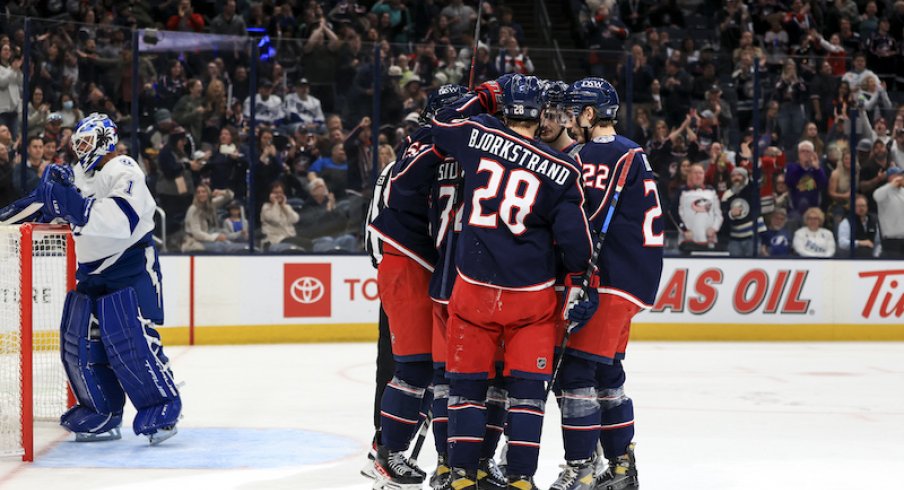 The Columbus Blue Jackets celebrate a third period goal against the Tampa Bay Lightning at Nationwide Arena.