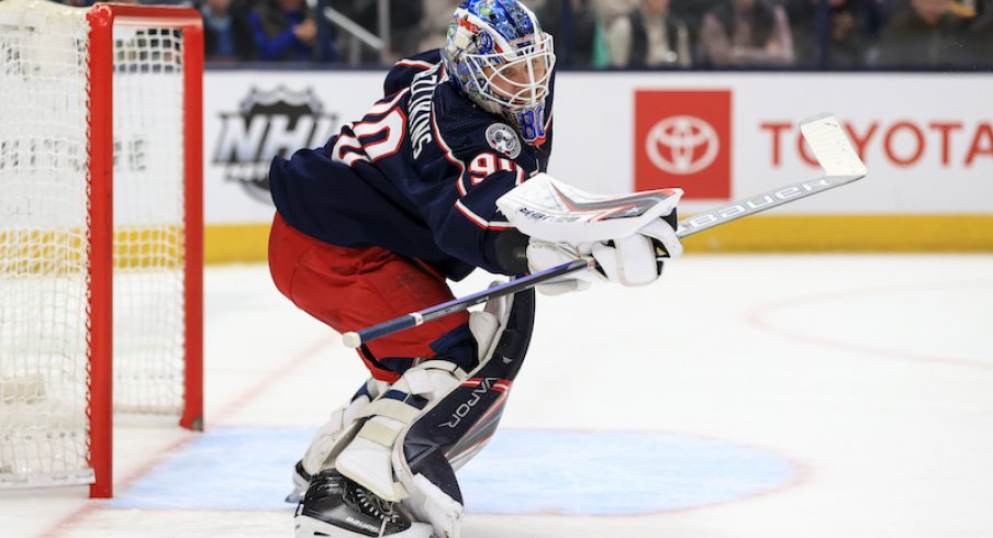 Columbus Blue Jackets' Elvis Merzlikins deflects the puck against the Tampa Bay Lightning at Nationwide Arena.