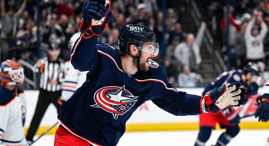 Columbus Blue Jackets center Sean Kuraly celebrates as his teammate scores against Edmonton Oilers goaltender Mikko Koskinen in the third period at Nationwide Arena.