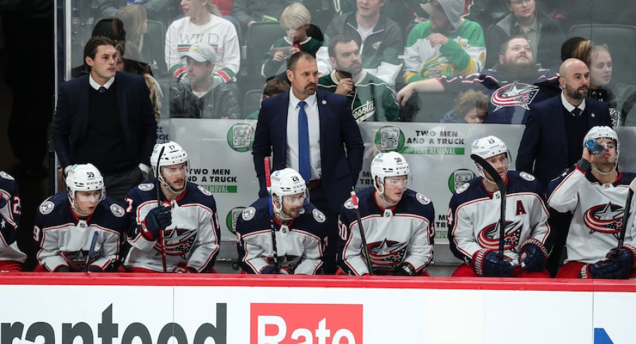 Columbus Blue Jackets' head coach Brad Larsen looks on in the third period against the Minnesota Wild at Xcel Energy Center.