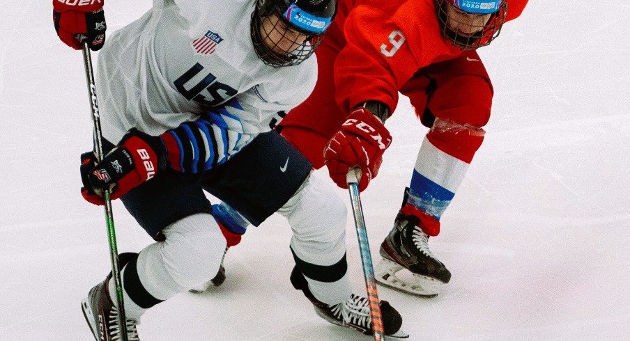 Danil Grigoriev RUS challenges Cutter Gauthier USA as he controls the puck during the RUS v USA Final of the Ice Hockey 6-Teams Men's competition at Vaudoise Arena. The Winter Youth Olympic Games.
