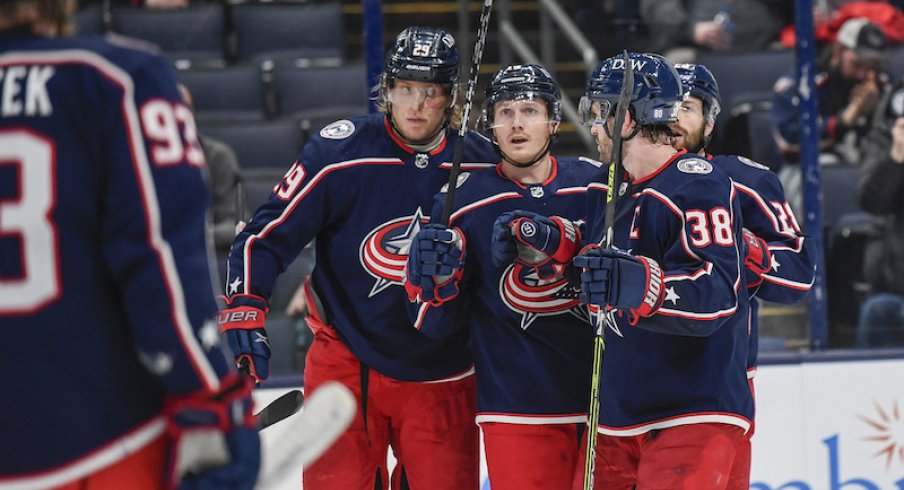 Columbus Blue Jackets' Patrik Laine celebrates his goal with teammates in the third period against the Toronto Maple Leafs at Nationwide Arena.