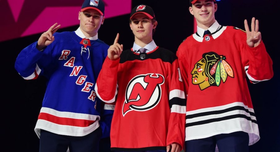 From left to right; Kaapo Kakko, Jack Hughes, Kirby Dach