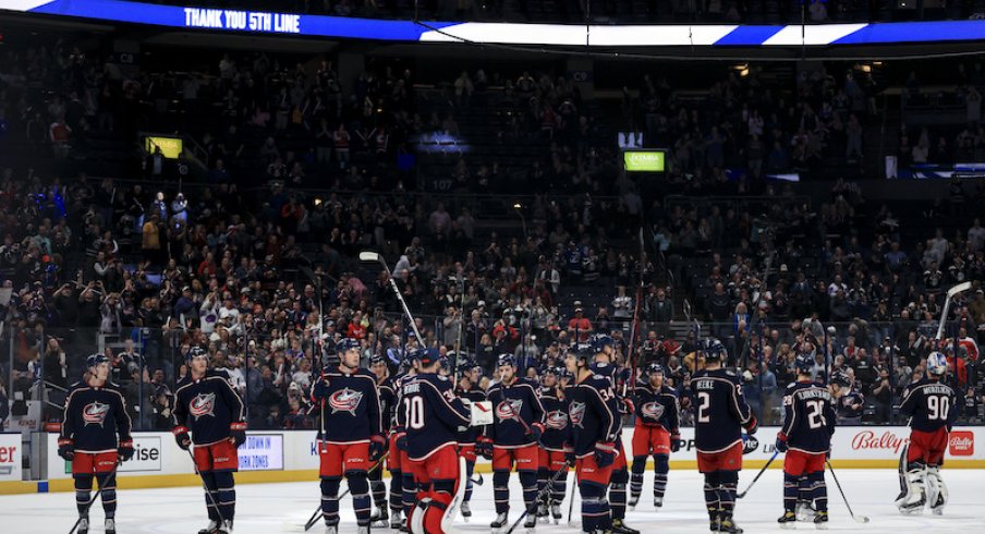 The Columbus Blue Jackets acknowledge the fans after the game against the Tampa Bay Lightning at Nationwide Arena in the home season finale.