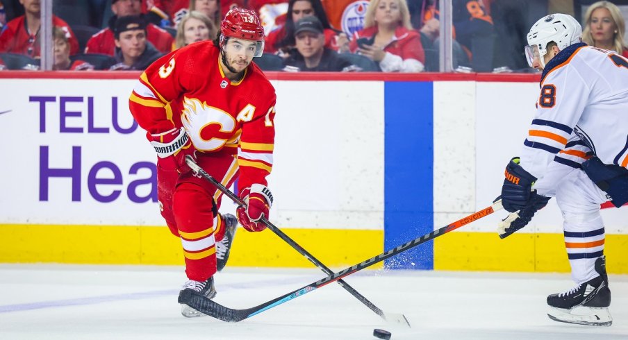 Johnny Gaudreau controls the puck against the Edmonton Oilers in game two of the second round of the 2022 Stanley Cup Playoffs