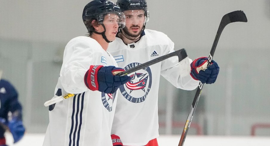 Kent Johnson and Kirill Marchenko chat during CBJ Development Camp