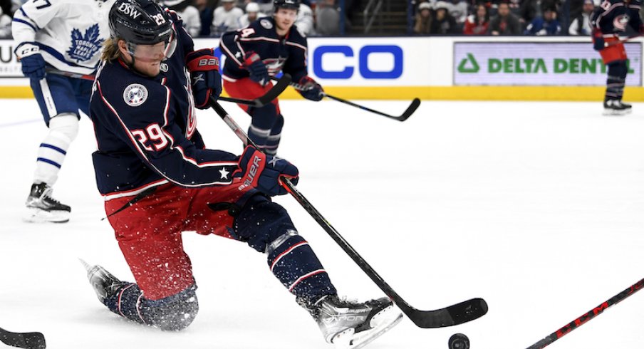 Columbus Blue Jackets' Patrik Laine plays the puck from his knee in the third period against the Toronto Maple Leafs at Nationwide Arena.