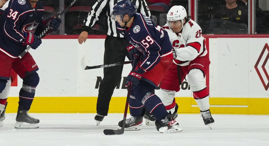 Yegor Chinakhov shoots and scores against the Carolina Hurricanes