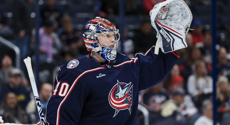 Columbus Blue Jackets goaltender Daniil Tarasov (40) gestures to teammates during a stop in play against the Buffalo Sabres in the first period at Nationwide Arena.