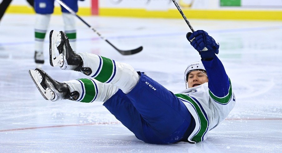 Vancouver Canucks center Curtis Lazar reacts as he falls against the Philadelphia Flyers.