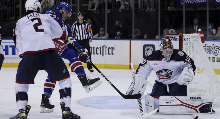 Columbus Blue Jackets' Daniil Tarasov makes a save against the New York Rangers during the second period at Madison Square Garden.