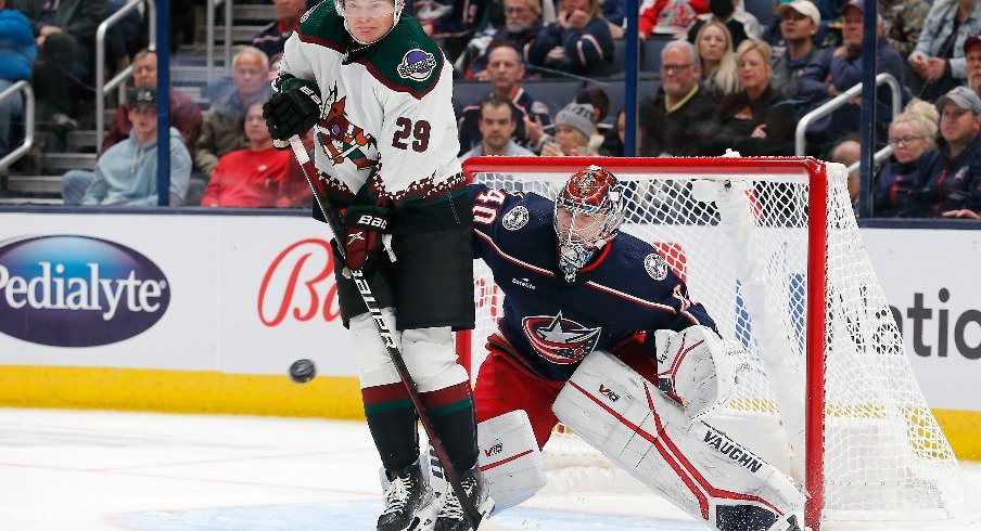 Arizona Coyotes center Barrett Hayton screens Columbus Blue Jackets goalie Daniil Tarasov during the second period at Nationwide Arena.