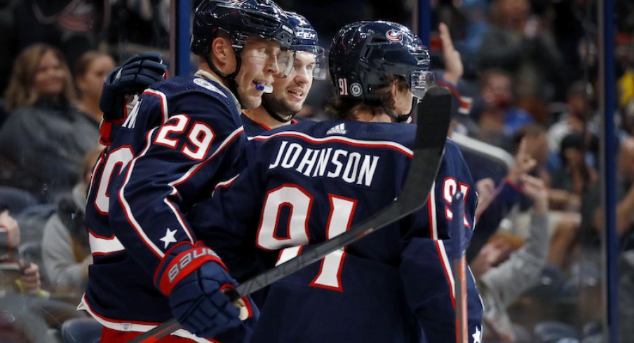 Columbus Blue Jackets' Patrik Laine celebrates his goal with forward Kent Johnson during the second period against the Pittsburgh Penguins at Nationwide Arena.
