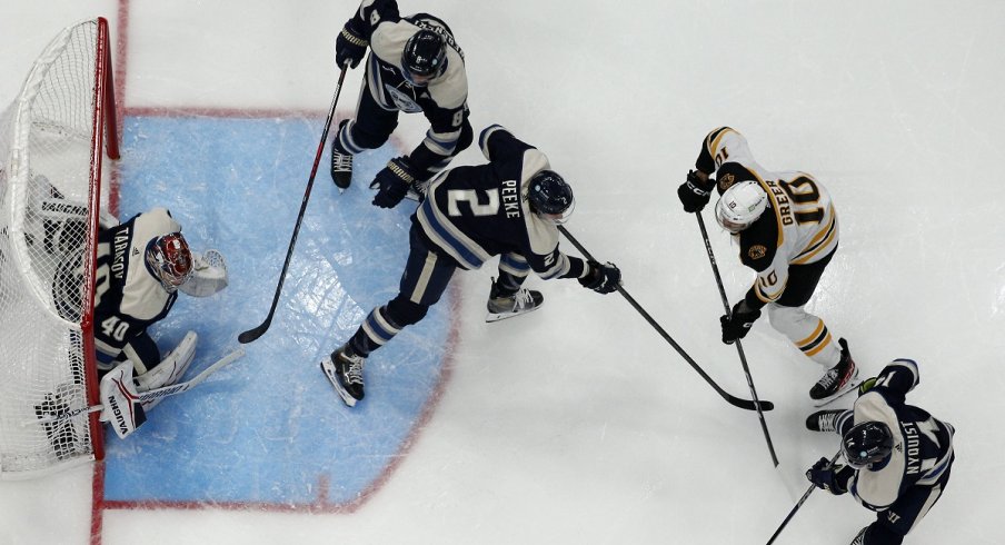 Columbus Blue Jackets goalie Daniil Tarasov makes a save against the Boston Bruins