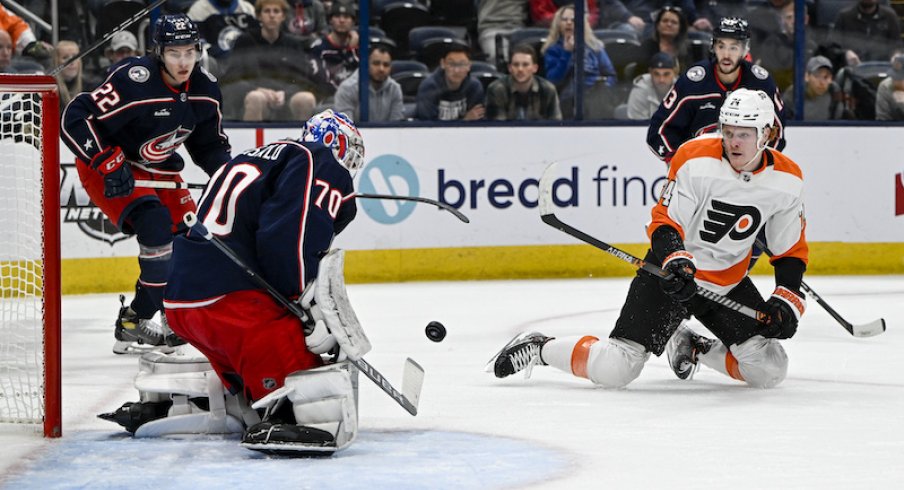 Columbus Blue Jackets' Joonas Korpisalo stops a shot from Philadelphia Flyers' Owen Tippett in the first period at Nationwide Arena.