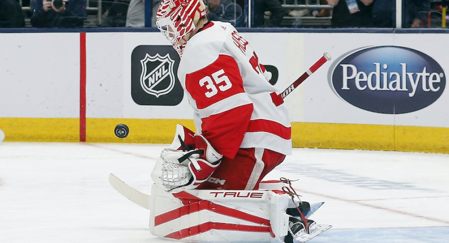 Detroit Red Wings' Ville Husso makes a save against the Columbus Blue Jackets during the second period at Nationwide Arena.