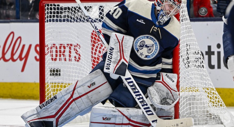 Columbus Blue Jackets' Daniil Tarasov makes a helmet save in the second period against the Florida Panthers at Nationwide Arena.