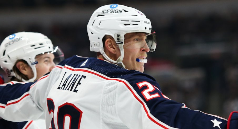 Columbus Blue Jackets' Patrik Laine celebrates his goal against Winnipeg Jets' David Rittich during the first period at Canada Life Centre.