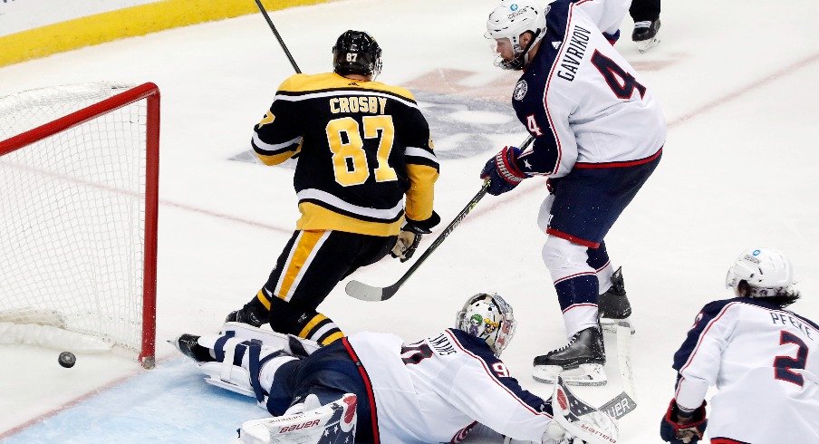 Pittsburgh Penguins center Sidney Crosby scores a goal past Columbus Blue Jackets goaltender Elvis Merzlikins during the second period at PPG Paints Arena.