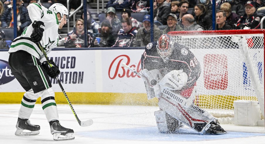 Columbus Blue Jackets' Daniil Tarasov makes a save against Dallas Stars' Roope Hintz in the second period at Nationwide Arena.