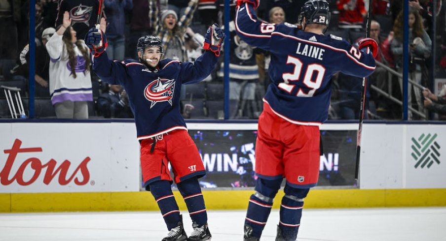 Columbus Blue Jackets Johnny Gaudreau' celebrates his game winning goal against the Los Angeles Kings with Columbus Blue Jackets' Patrik Laine in overtime at Nationwide Arena.