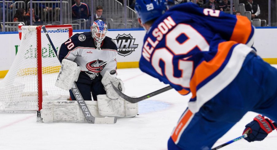 Columbus Blue Jackets' Joonas Korpisalo makes a save against New York Islanders' Brock Nelson during the second period at UBS Arena.