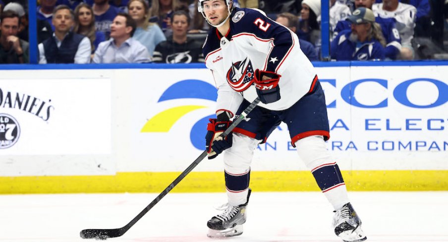 Columbus Blue Jackets' Andrew Peeke skates with the puck against the Tampa Bay Lightning during the third period at Amalie Arena.
