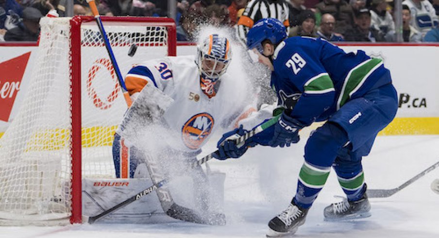 Lane Pederson shoots a puck on Ilya Sorokin.