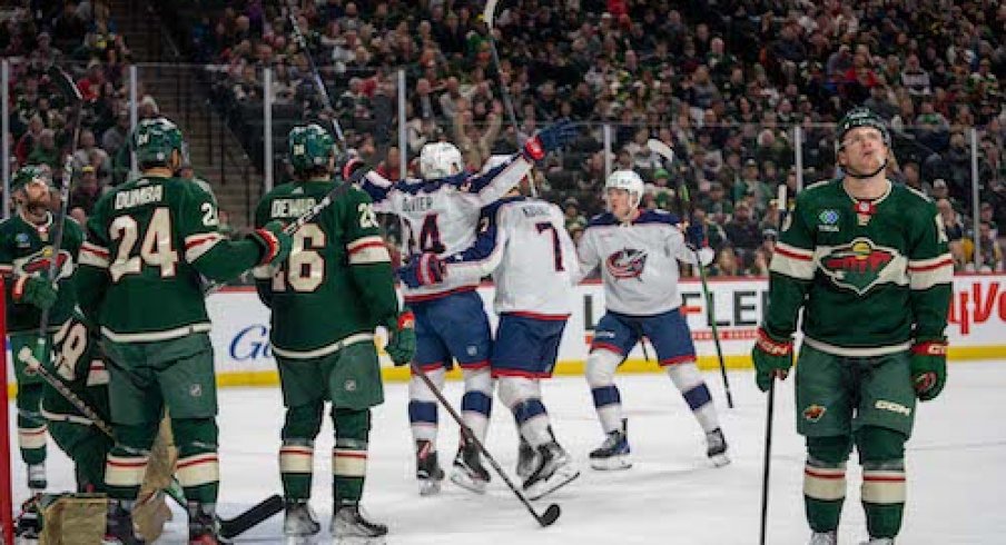 Mathieu Olivier celebrates with his teammates after scoring a goal in the Blue Jackets vs. Wild gam.