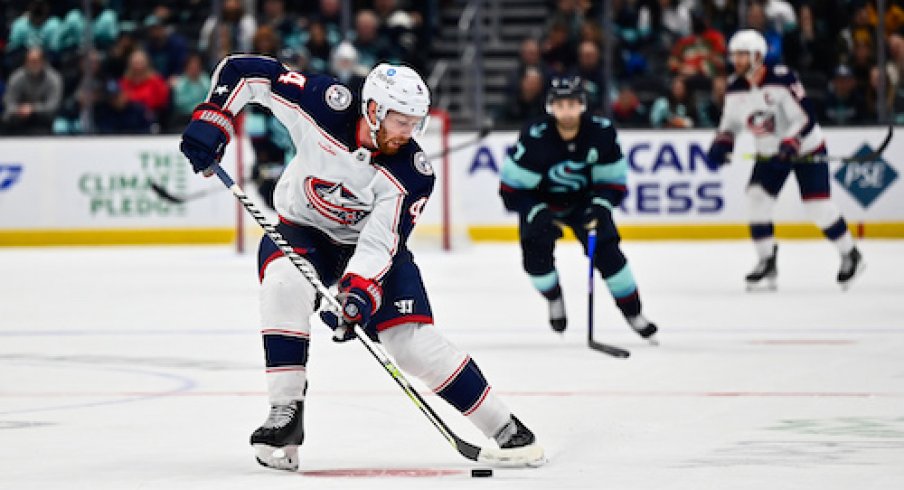 Vladislav Gavrikov handles the puck in the Blue Jackets vs. Kraken game.