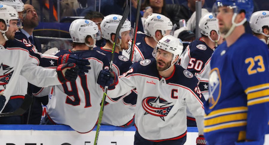 Boone Jenner celebrates after scoring a goal in the Blue Jackets vs. Sabres game.