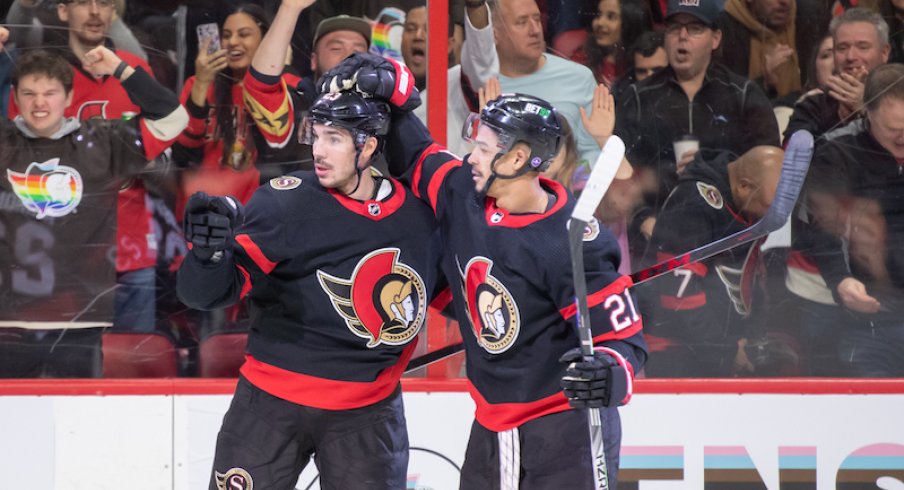 Ottawa Senators' Travis Hamonic celebrates with Mathieu Joseph his goal scored in the first period against the Columbus Blue Jackets at the Canadian Tire Centre.