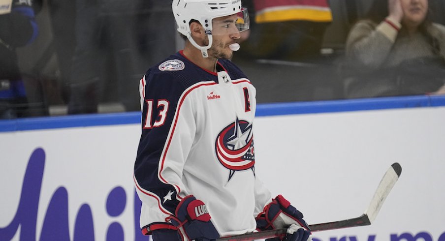 Columbus Blue Jackets' Johnny Gaudreau blows a bubble during the warm-up before a game against the Toronto Maple Leafs at Scotiabank Arena.