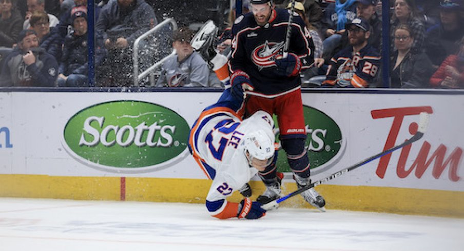 Erik Gudbranson and Anders Lee collide in the Islanders vs. Blue Jackets game.