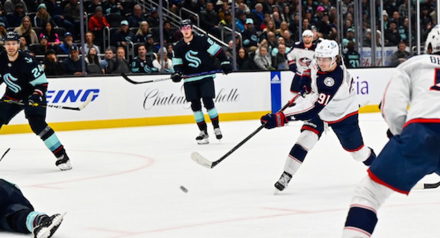 Kent Johnson scores a goal against the in the Blue Jackets vs. Seattle Kraken game.