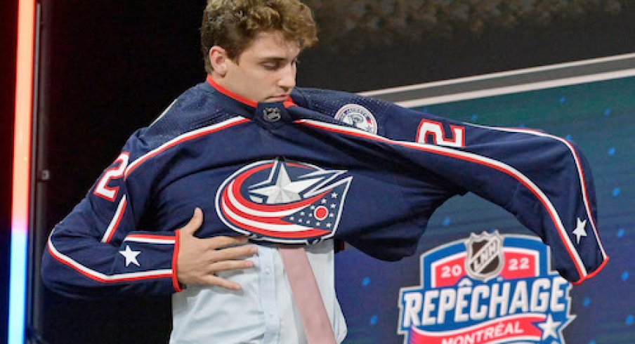 Denton Mateychuk after being selected as the number twelve overall pick to the Columbus Blue Jackets in the first round of the 2022 NHL Draft at Bell Centre.