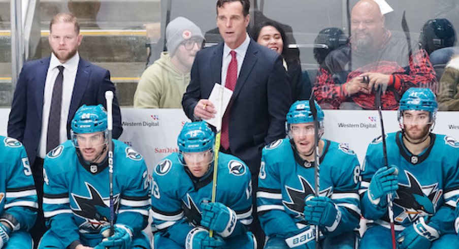 San Jose Sharks head coach David Quinn and assistant coach Ryan Warsofsky behind the bench during the third period against the Anaheim Ducks at SAP Center at San Jose.