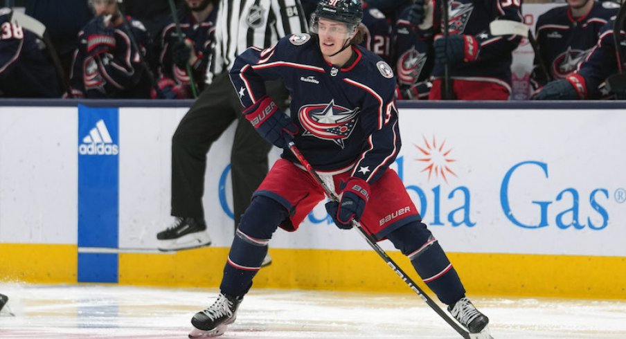 Columbus Blue Jackets' Kent Johnson skates with the puck during the second period against the Ottawa Senators at Nationwide Arena.