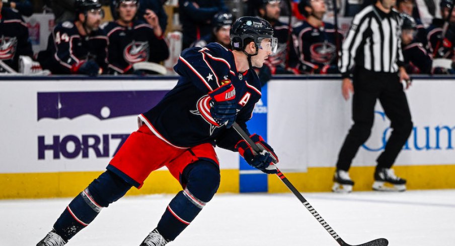 Columbus Blue Jackets' Zach Werenski skates with the puck against the Philadelphia Flyers in the first period at Nationwide Arena.