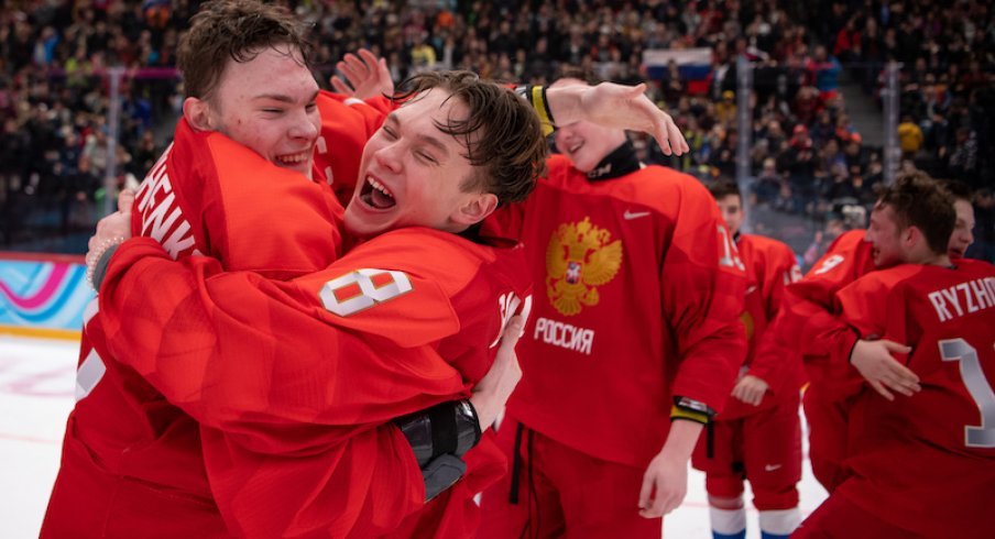 Ivan Miroshnichenko and Mikhail Gulyayev celebrate their victory in the RUS v USA Final of the Ice Hockey 6-Teams Men's competition at Vaudoise Arena. The Winter Youth Olympic Games.