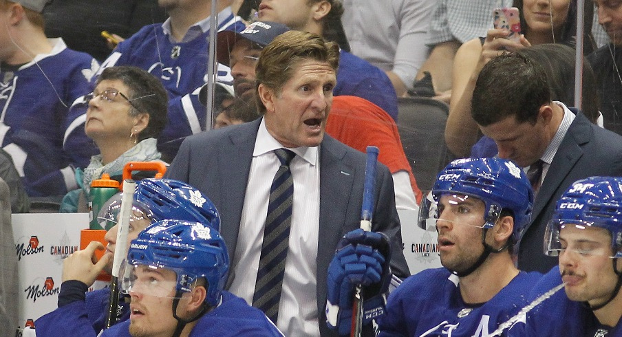 Toronto Maple Leafs head coach Mike Babcock talks to his players during a game against the Montreal Canadiens at Scotiabank Arena. Toronto defeated Montreal.